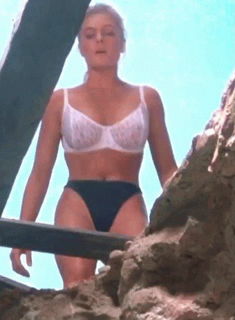 Photo by xcitedoc with the username @xcitedoc,  May 31, 2024 at 7:56 AM. The post is about the topic Erika Eleniak and the text says 'Erika in Chasers (1994) #erikaeleniak #lingerie'
