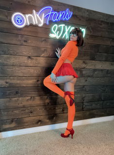 Album by sjxoxo with the username @sjxoxo, who is a star user,  April 5, 2022 at 11:32 PM. The post is about the topic Cosplay and the text says 'Jinkies! This magic rod has to help me solve my mystery! 

Don't miss out on my week of naughty Velma Content!!'