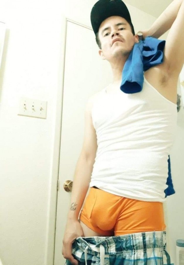 Photo by misterdb with the username @misterdb, who is a verified user,  June 14, 2022 at 6:25 PM and the text says 'orange STARTER boxer-briefs

#dickprint #visiblepenisline #UnderwearForMen'