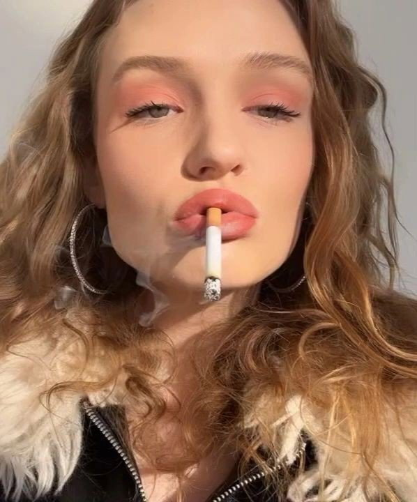Photo by LOVEMYWORLD3 with the username @LOVEMYWORLD3, who is a verified user, posted on March 1, 2024. The post is about the topic LOVESMOKINGWOMEN3