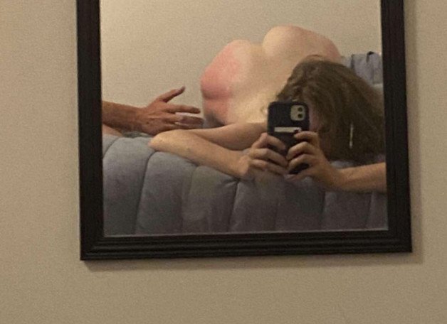 Photo by YourSpanker with the username @Onlyspanks, who is a verified user,  August 17, 2022 at 6:28 AM. The post is about the topic Only Spanks and the text says 'Mirror, mirror on the wall, who is the (f)airest of them all? 👋💥🍑  #daddy #spanking #spanker #spankee #slap #slapass #ass #redass #onlyspanks #discipline #otk'