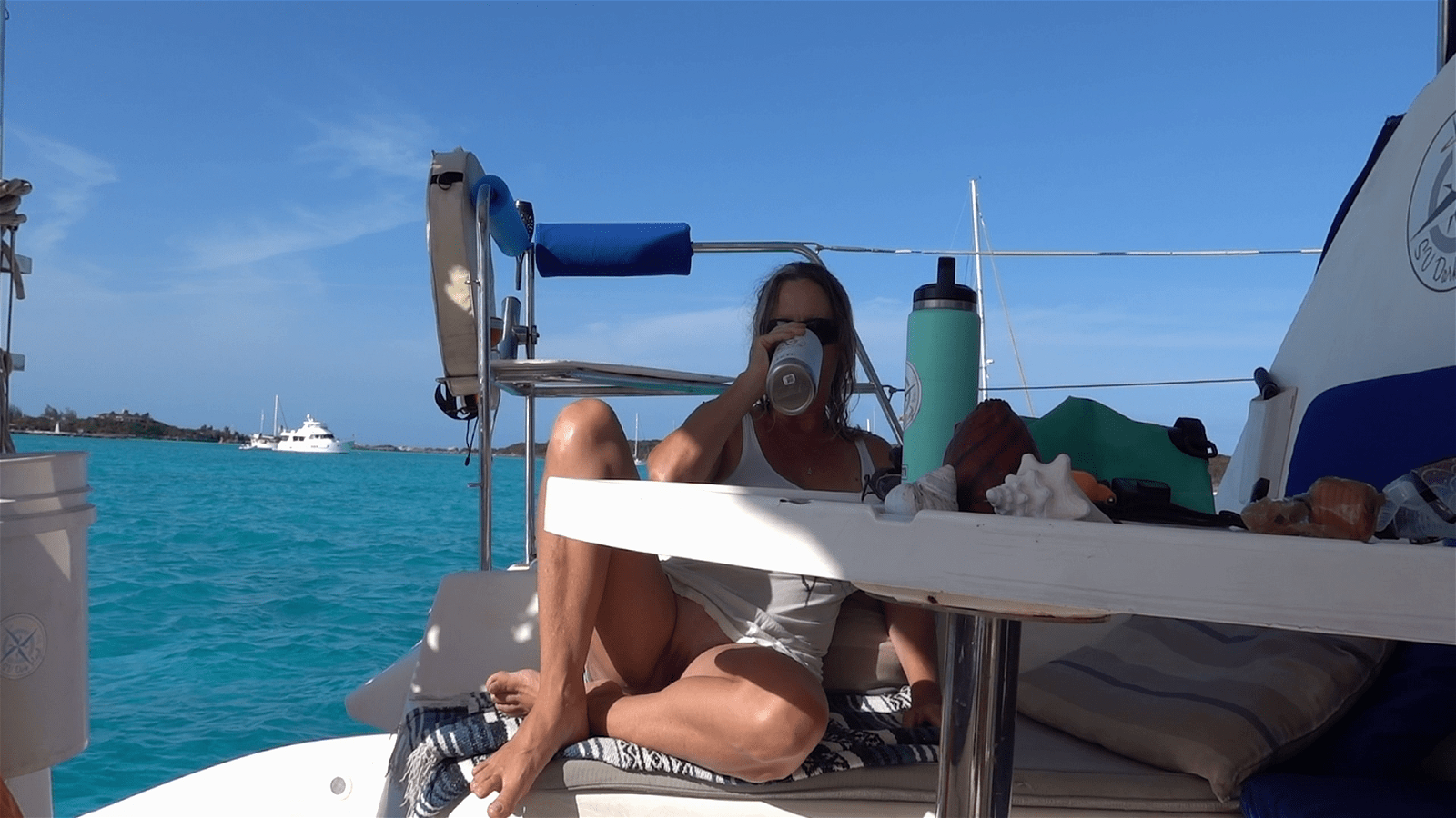Photo by Sailing Angel with the username @sailingangelxxx, who is a verified user,  May 16, 2024 at 6:32 PM and the text says 'My New Video is LIVE! 📹🤿🏖️⛵️🦈
I say good-bye to stunning Thomas Cay and sail to Big Majors Cay, where the boat in front of us is cleaning fish. That makes swimming and checking the anchor a whole different ball game! I'm not just dodging tour boats,..'