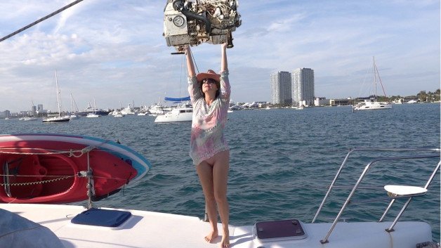 Photo by Sailing Angel with the username @sailingangelxxx, who is a verified user,  February 26, 2024 at 1:19 PM and the text says 'I'm back aboard a friend's cat, replacing a major component in a skinny compartment. Sailor ingenuity gets the job done. 
Extended, Uncensored, OnDemand at 
https://vimeo.com/ondemand/sailingdarkangel/916528356 with a bonus shower montage 🚿🔥'