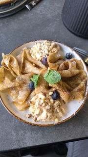 Photo by Terefur with the username @Terefur, who is a star user,  December 20, 2024 at 4:30 PM and the text says 'I’m not a big fan of pancakes, but these with blueberries and whipped condensed milk were absolutely delicious! 😋
 #Pancakes #Blueberries #Sweet #Delicious #Yummy #Food #Tasty #Treat #Breakfast'