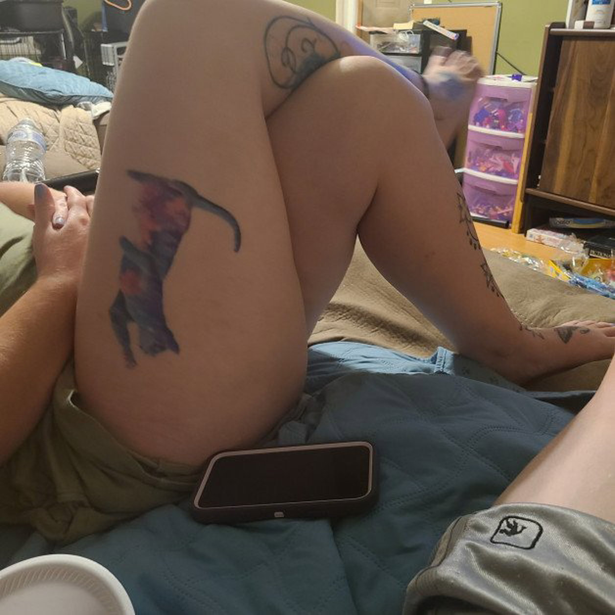 Photo by KinkyKoupl with the username @KinkyKoupl, who is a verified user,  August 27, 2023 at 1:19 PM. The post is about the topic Tattoo and the text says 'Just chilling watching some TV #sundayvibes #SundayFunday #tattoos'