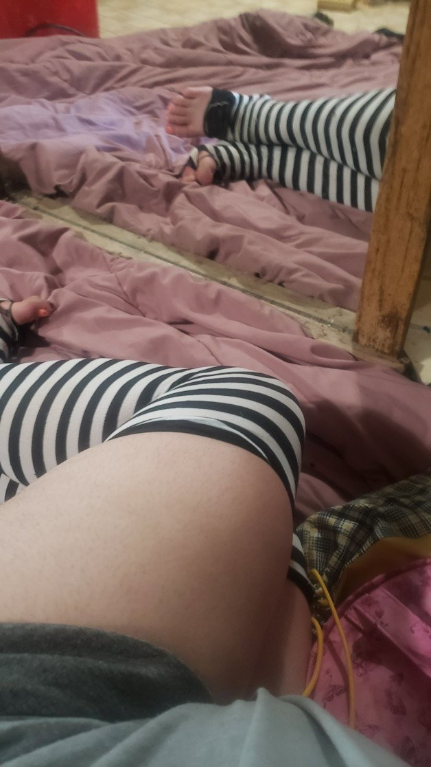 Photo by VickyVixen13 with the username @VickyVixen13, who is a verified user,  September 27, 2022 at 1:34 PM and the text says '#feet #fetish #footfetish #stockings #legs #paintedtoes #nailpolish #woman #stripes #amateur #homemade #mirror'