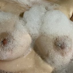 Photo by FoodyBooties with the username @FoodyBooties, who is a verified user,  June 7, 2023 at 2:03 PM. The post is about the topic Big Natural Boobs and the text says 'Bubbles and boobs 🫧'