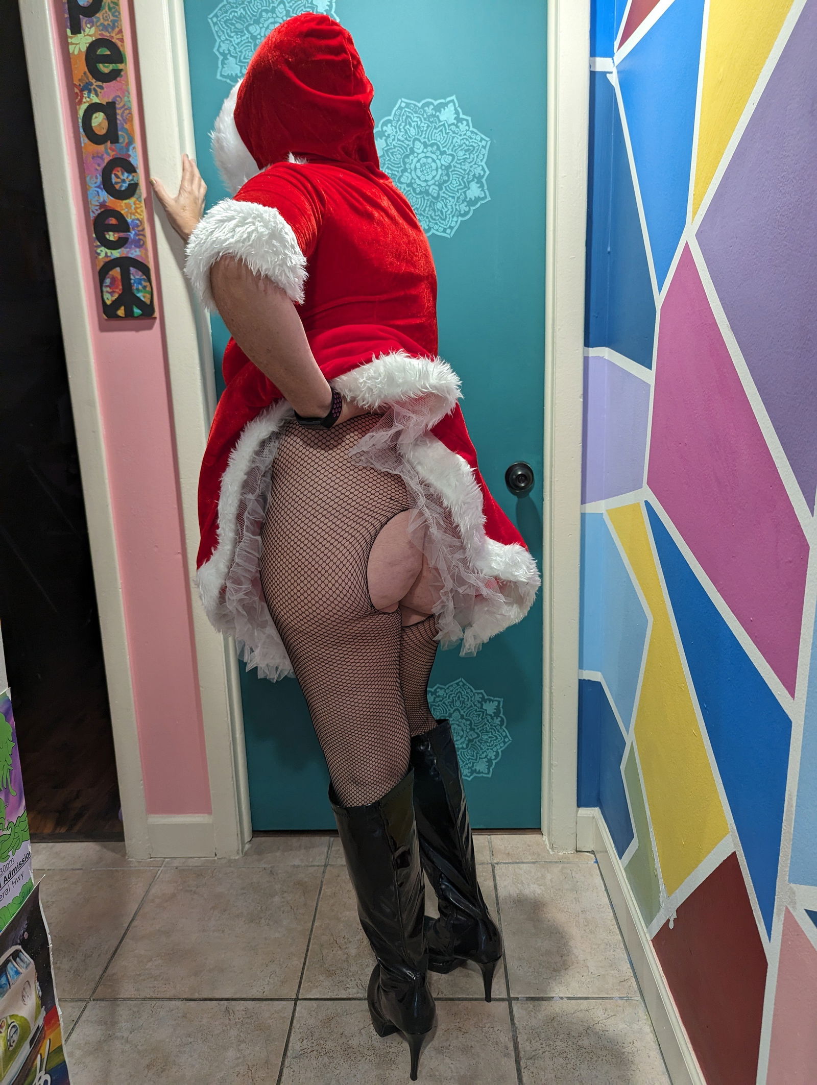 Album by FLMILF2022 with the username @FLMILF2022, who is a verified user,  December 24, 2023 at 3:03 PM. The post is about the topic chubby amateurs and the text says 'Ho Ho Ho
Merry Christmas
#milf #mrsclause #curvy'