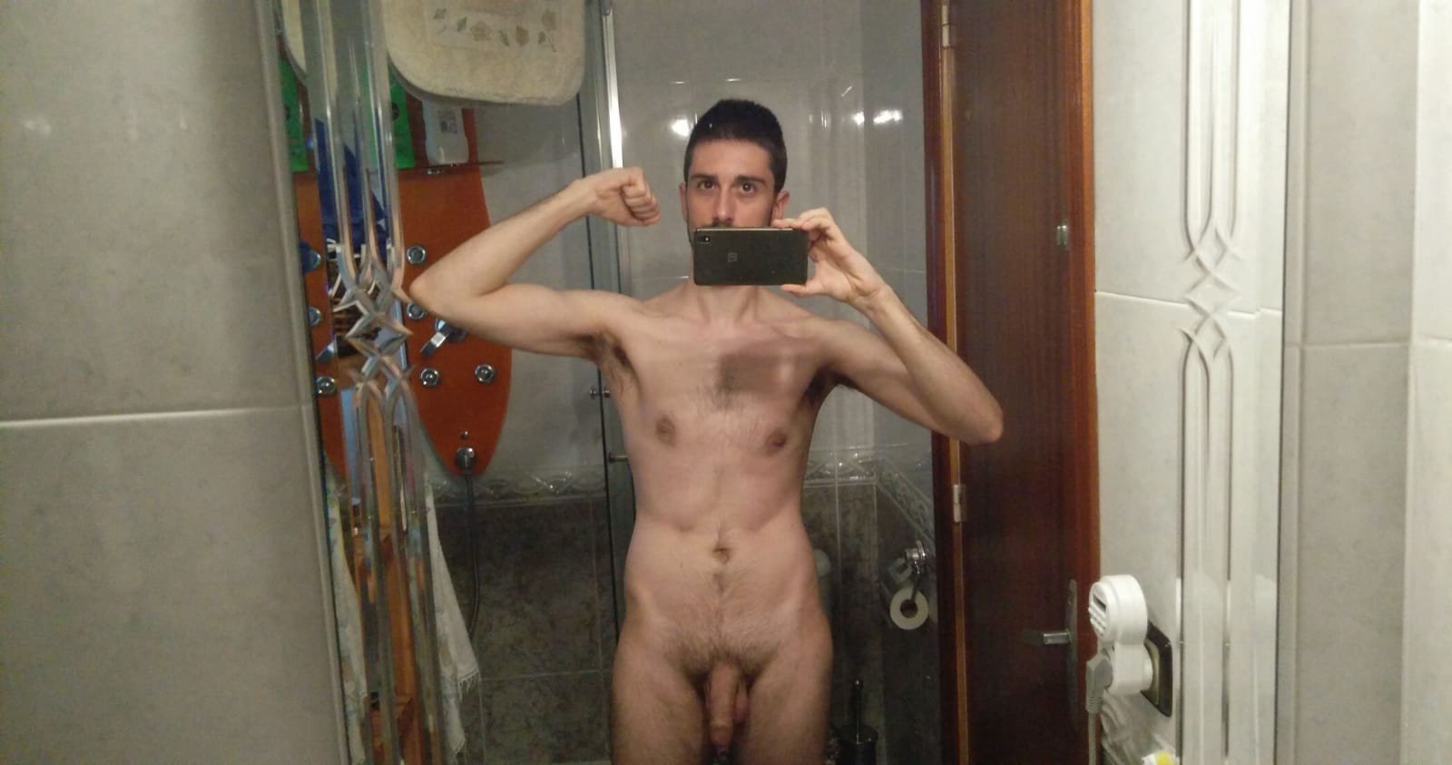 Photo by gzoriol with the username @gzoriol, who is a verified user,  December 29, 2022 at 4:08 PM and the text says '#gayboyfriend #boyfriend #gaycouple #dick #gaydick #nude #gaynude #mirror #gaymirror #gayhairy'