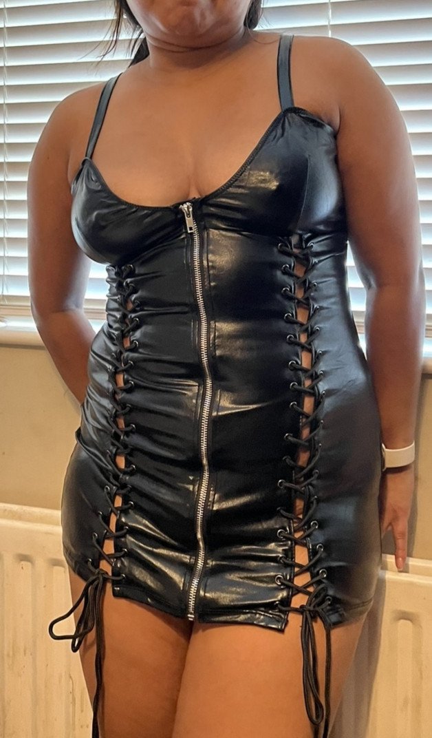 Photo by constantlyhornyH with the username @constantlyhornyH, who is a verified user,  November 19, 2022 at 7:19 AM and the text says 'Club night 😜 #pvc #dress #hotwife. OnlyFans.com/naughtywifey4'