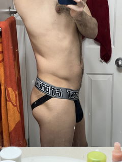 Album by DPBTM4HungTops with the username @DPBTM4HungTops, who is a verified user,  March 22, 2023 at 5:07 AM. The post is about the topic Guys in Jockstraps and the text says 'Which one do you think looks better? (Red, Blue, Grey) or all of them??? Cause honestly I love them all'