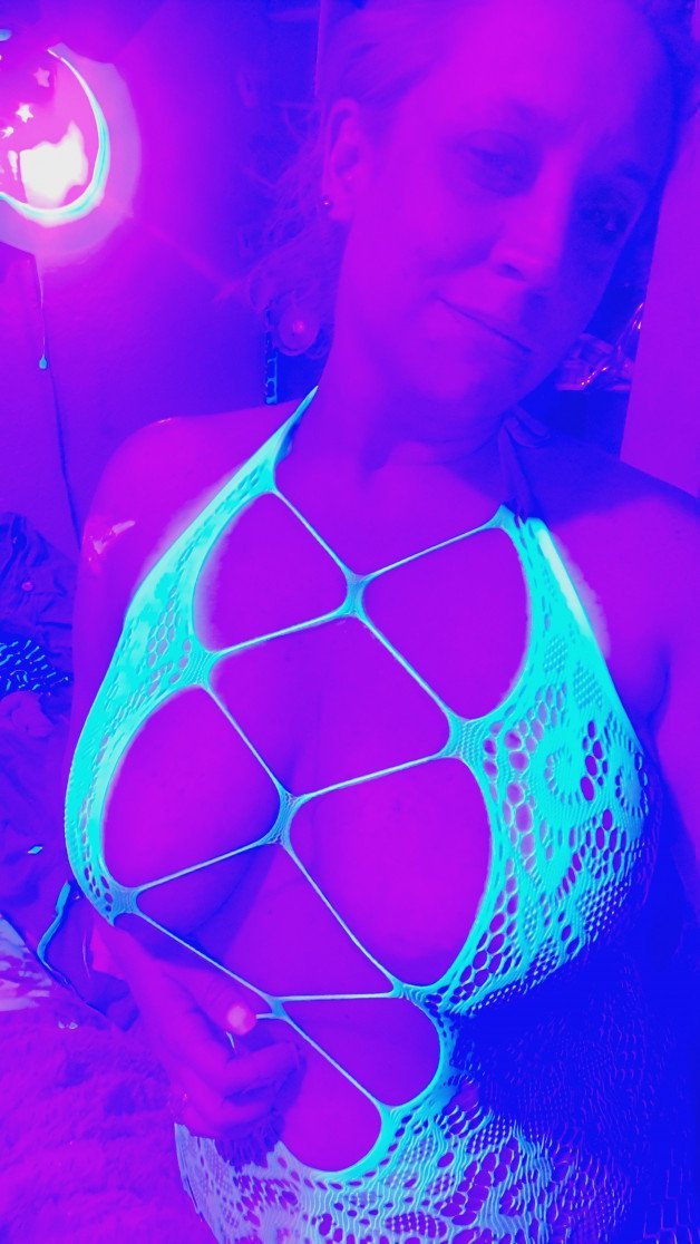 Photo by Harley Queen with the username @Imqueenharley, who is a star user,  April 23, 2024 at 11:08 AM. The post is about the topic influencersgonewild and the text says '#blacklight lingerie is my favorite lingerie. wbu?'