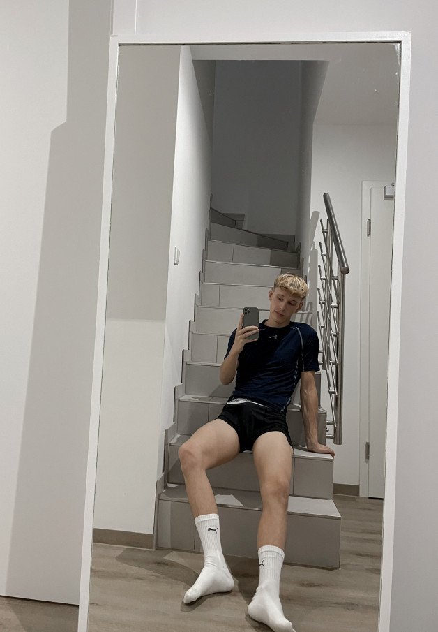 Photo by jaayjakob with the username @jaayjakob, who is a verified user,  August 11, 2024 at 2:02 PM. The post is about the topic Gay and the text says 'I’m so sweaty from the sport (especially my socks) 🥇'