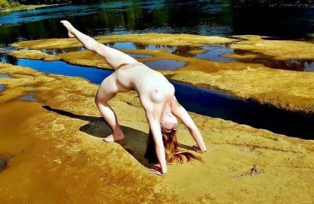 Photo by SirinaDroll with the username @sirinadroll, who is a verified user,  May 26, 2023 at 3:39 AM. The post is about the topic Beauty Outdoor and the text says '#acrobatic #nu #CMNF #spycam #barefoot #cheeky #nakedinnature #nudists #nudism #fkk #nude'
