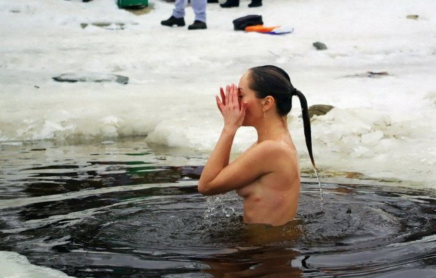 Photo by SirinaDroll with the username @sirinadroll, who is a verified user,  January 31, 2024 at 8:21 PM. The post is about the topic Beauty Outdoor and the text says 'Traditional winter dip in the ice hole
#winter #snowgirl #winterdip #winterdipping #winterduck'