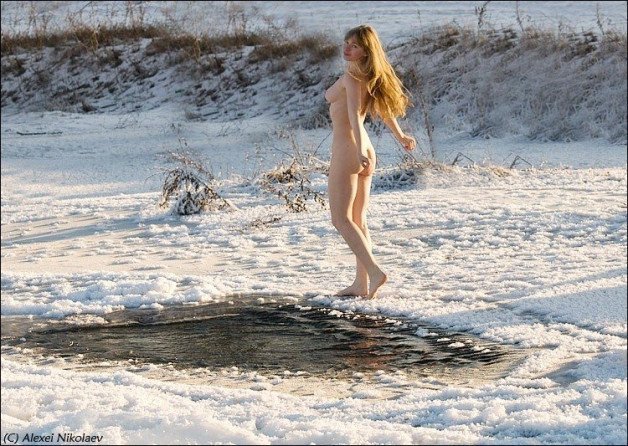 Photo by SirinaDroll with the username @sirinadroll, who is a verified user,  January 31, 2024 at 7:45 PM. The post is about the topic Beauty Outdoor and the text says 'Traditional winter dip in the ice hole
#winter #snowgirl #winterdip #winterdipping #winterduck'