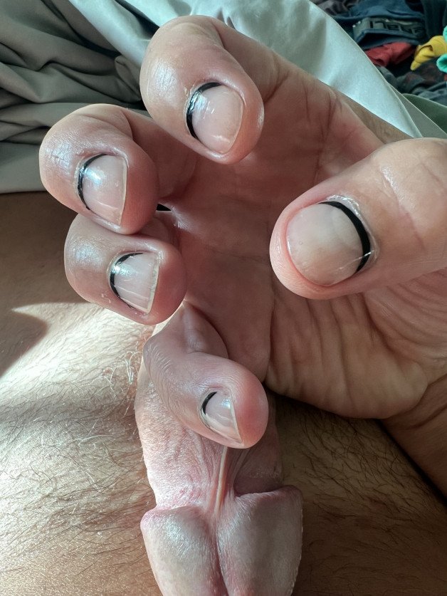 Photo by Danny-tr with the username @Danny-tr, who is a verified user,  June 15, 2024 at 10:59 AM and the text says 'i love my new nails. let me know your thoughts'