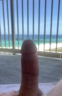 Album by Sticksquirt31 with the username @Sticksquirt31, who is a verified user,  July 28, 2024 at 10:32 AM. The post is about the topic Flashers and Public Nudes and the text says 'Getting some air on the Balcony, wonder if anyone has binoculars, and is catching a glimpse. Thats a turn on! wish they would come find me and give me a hand out here in the cool ocean breeze!'