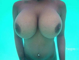 Photo by sexgifmaker with the username @sexgifmaker, who is a verified user,  February 4, 2024 at 2:38 PM. The post is about the topic Wet and the text says 'Kiky's tits below water..'