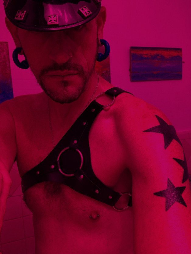 Photo by Dxbx369 with the username @Dxbx369, who is a verified user,  November 26, 2023 at 11:30 AM. The post is about the topic Satanic fuckers and the text says 'http://www.369hellpigs.com/

#satanic #pig #top #leather #tattoo #piercings'
