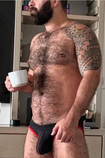 Photo by FurFactor with the username @FurFactor, who is a verified user,  July 5, 2024 at 10:14 AM. The post is about the topic Gay Dudes & Coffee Cups and the text says 'Coffee goes great with a furry belly'
