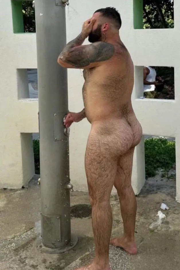 Photo by FurFactor with the username @FurFactor, who is a verified user,  July 1, 2024 at 2:04 PM. The post is about the topic Gay Outdoor Shower and the text says 'Does a Wild Bear shower outside?  YEP!  Exposing that beefy hairy butt for all to see'