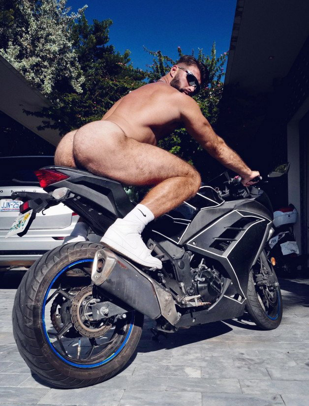 Photo by mike50667 with the username @mike50667, who is a verified user,  December 21, 2023 at 1:56 PM. The post is about the topic GoAuto and the text says '#goAuto, #motorcycle, #ass, #butt, #sneakers, #crack, #cross, #shades'