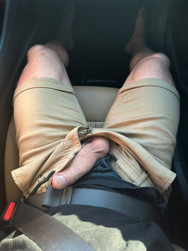 Photo by mike50667 with the username @mike50667, who is a verified user,  February 6, 2024 at 10:19 AM. The post is about the topic GoAuto and the text says '#goAuto #car #dick #cock #hardon #shorts #feet #leg #gay #outdoors'
