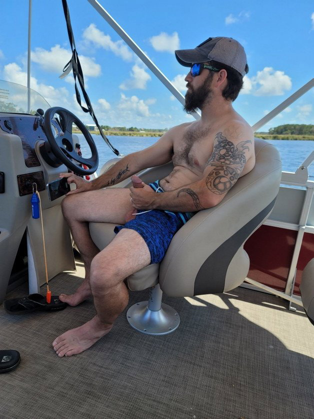 Photo by mike50667 with the username @mike50667, who is a verified user,  September 24, 2023 at 12:12 PM. The post is about the topic GoOutdoors and the text says '#goOutdoors, #boat, #sea, #beard, #tattoo, #dick, #wank, #jerkoff, #seat'