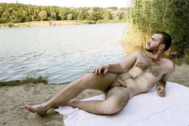 Photo by mike50667 with the username @mike50667, who is a verified user,  January 31, 2024 at 1:25 PM. The post is about the topic GoOutdoors and the text says '#goOutdoors, #sea, #lake, #bank, #naked, #outdoors, #gay, #dick, #cock, #towel, #hairy, #beard, #pose'