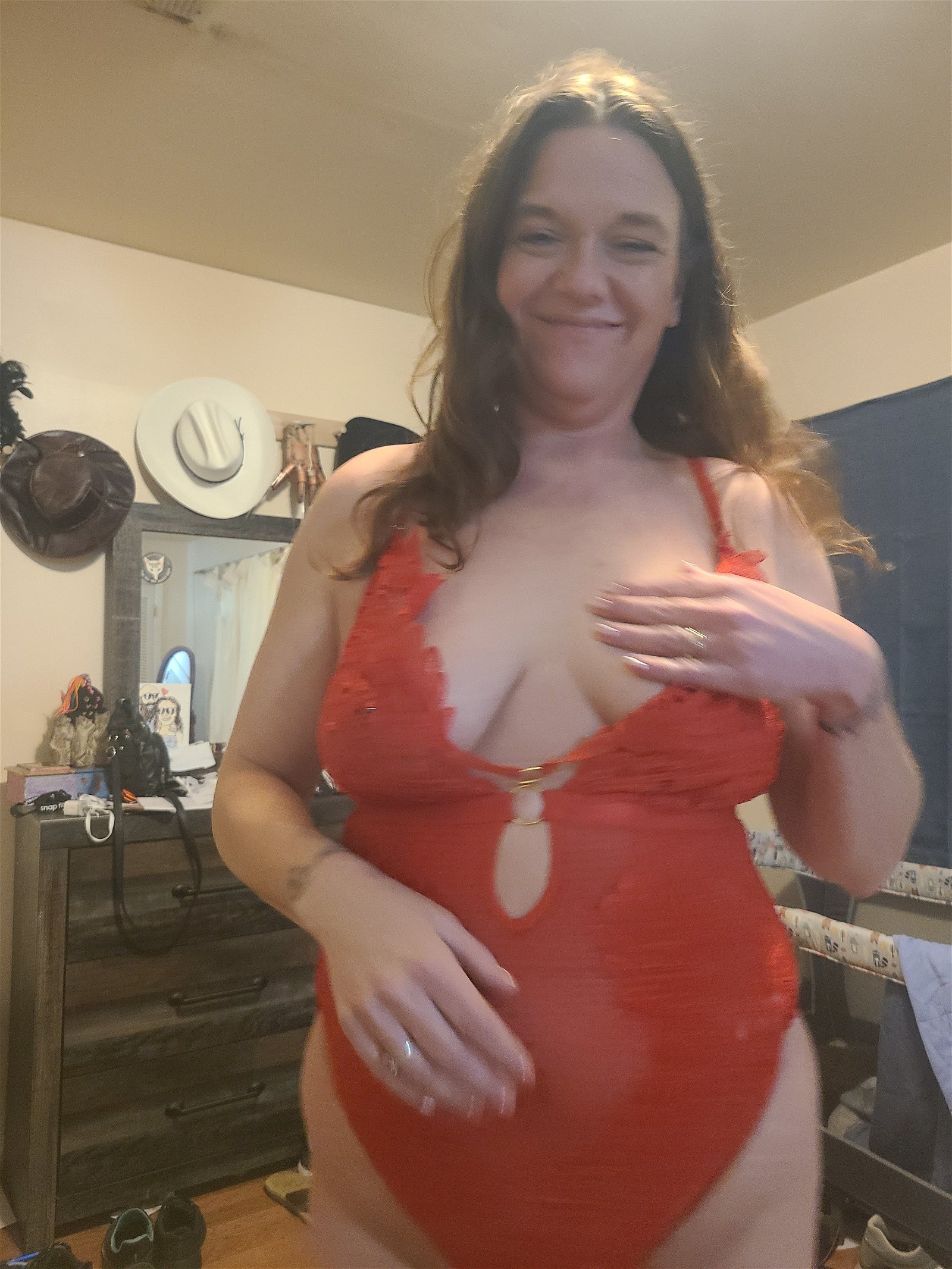 Photo by ExhibCouplePlayTime with the username @ExhibCouplePlayTime, who is a verified user,  February 16, 2024 at 12:49 AM. The post is about the topic MILF and the text says 'New red lingerie, hubby liked it a lot, he came so hard inside me while i rode his cock reverse cowgirl!'