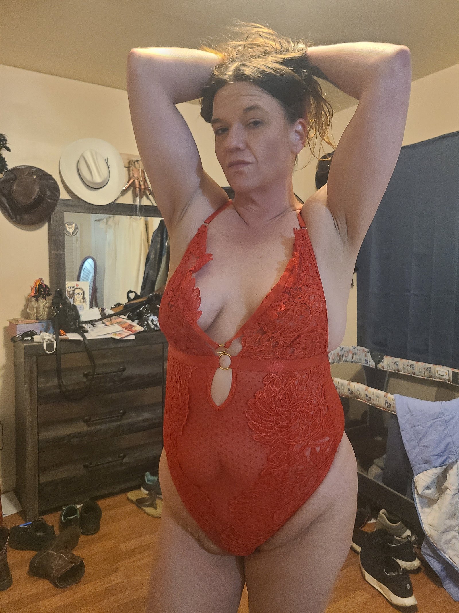 Photo by ExhibCouplePlayTime with the username @ExhibCouplePlayTime, who is a verified user,  February 16, 2024 at 12:49 AM. The post is about the topic MILF and the text says 'New red lingerie, hubby liked it a lot, he came so hard inside me while i rode his cock reverse cowgirl!'