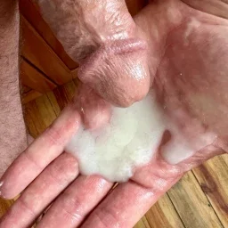 Photo by cockerotica with the username @cockerotica, who is a verified user,  April 3, 2024 at 7:17 PM. The post is about the topic Jacking off and the text says 'After a week of repeated edging, I exploded! This huge load of baby batter fills my hand. Hate to waste it!'