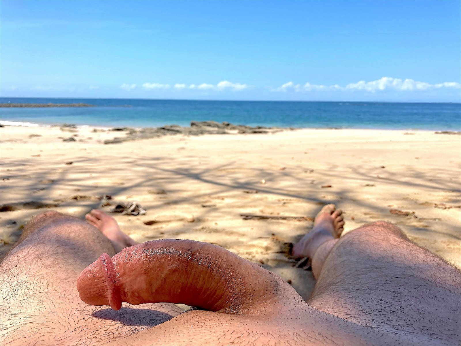 Photo by cock erotica with the username @cockerotica, who is a verified user,  May 14, 2024 at 8:27 PM. The post is about the topic Nude Beach Fun and the text says 'Naked fun on a tropical beach'