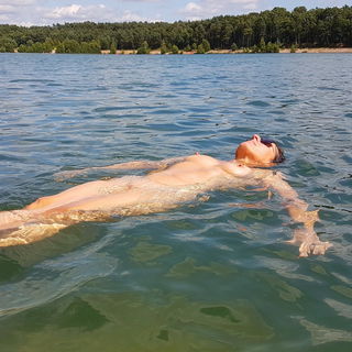 Photo by somethingz with the username @somethingz, who is a verified user,  October 4, 2024 at 2:49 PM. The post is about the topic Nudist4all and the text says '#nudist #naked #lake #outdoor #woman #sweet  #tits #outdoor #'