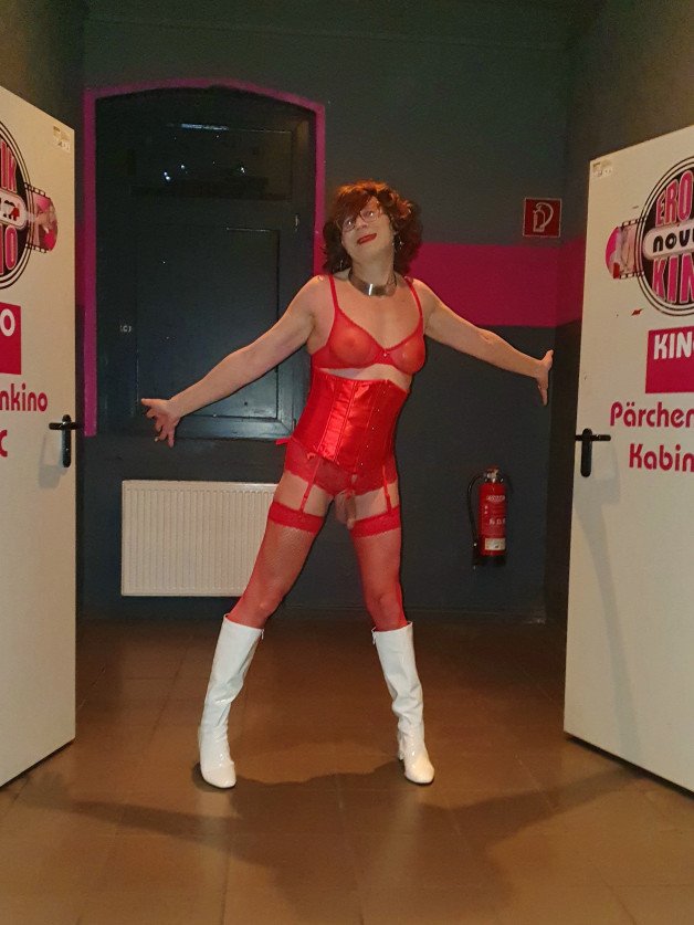 Album by somethingz with the username @somethingz, who is a verified user,  February 11, 2024 at 8:02 PM. The post is about the topic GloryHoles, Bookstores, Theaters and the text says '#porn #cinema #theater #dessous #red #bra #tits #sissy #crossdresser #boots #novum #pk'