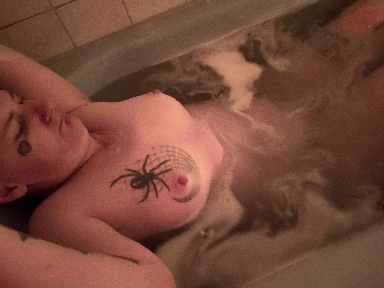 Album by DionysusZenunim with the username @DionysusZenunim, who is a star user,  September 24, 2023 at 6:00 PM. The post is about the topic Anarchist Punk Trans Man and the text says 'Kinky Queer Anarchist Punk Trans Man relaxing in a candlelit bath, listening to Folk Punk (Apes of the State to be specific) after a hard day causing trouble and fighting fascism!!!'