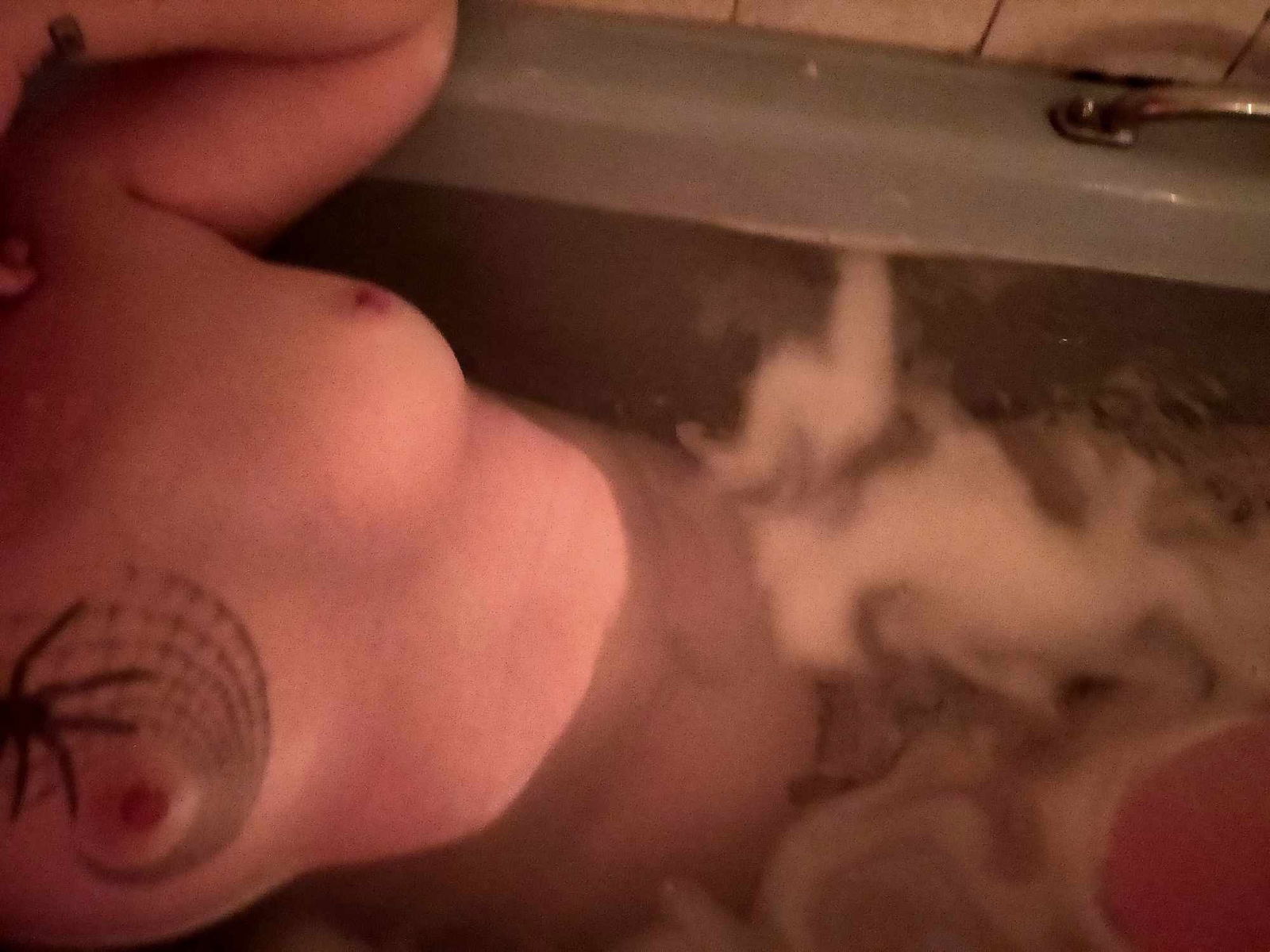 Album by DionysusZenunim with the username @DionysusZenunim, who is a star user,  September 24, 2023 at 6:00 PM. The post is about the topic Anarchist Punk Trans Man and the text says 'Kinky Queer Anarchist Punk Trans Man relaxing in a candlelit bath, listening to Folk Punk (Apes of the State to be specific) after a hard day causing trouble and fighting fascism!!!'