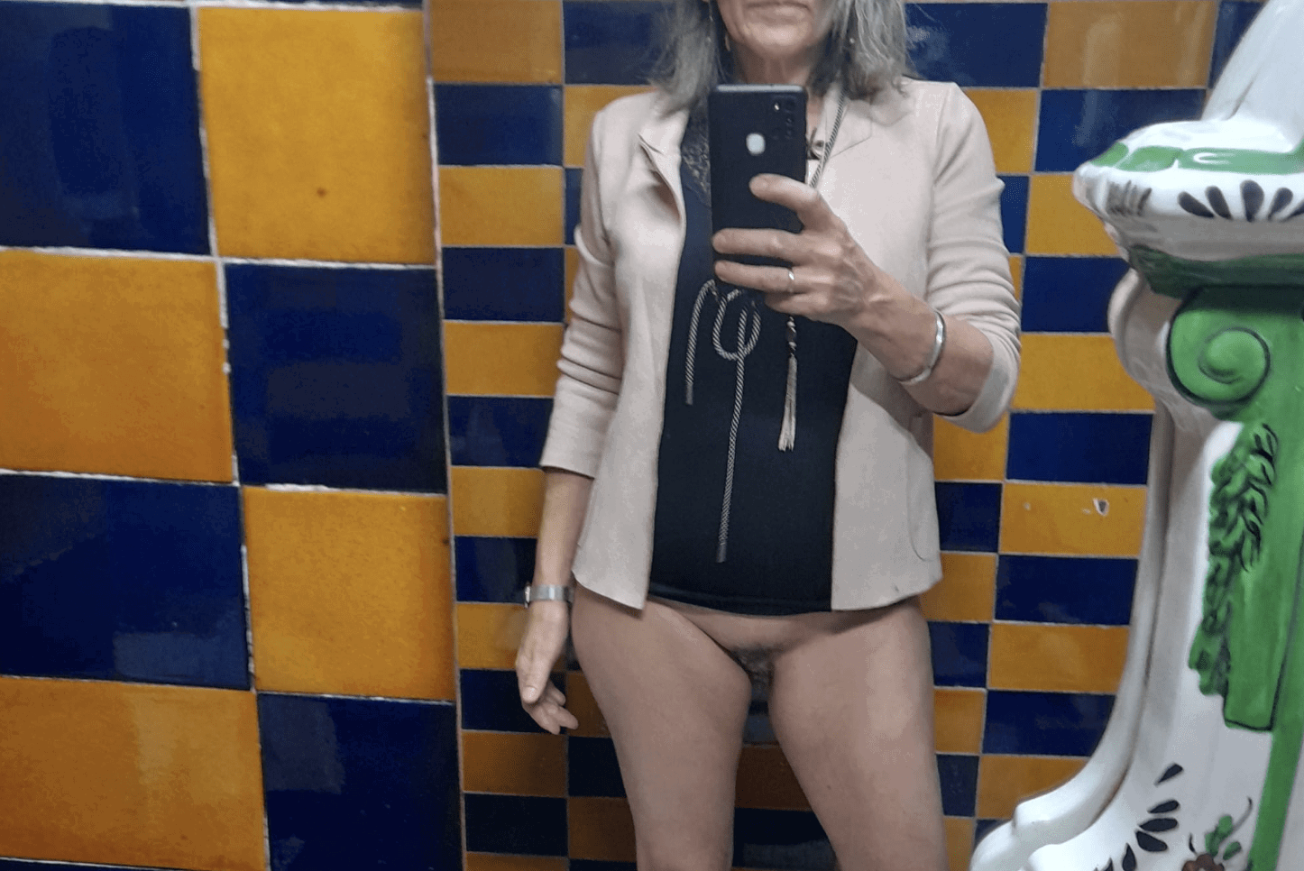 Photo by Riar with the username @Riar, who is a verified user,  December 12, 2023 at 4:51 PM. The post is about the topic Public  Flashing and the text says '#selfie #sexting #piss #tits #myself'