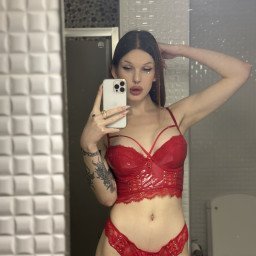 Photo by Milana.ts with the username @Milana11, who is a star user,  April 15, 2024 at 9:52 AM. The post is about the topic Transgender Gallery and the text says 'Do trans girls look good in red?'