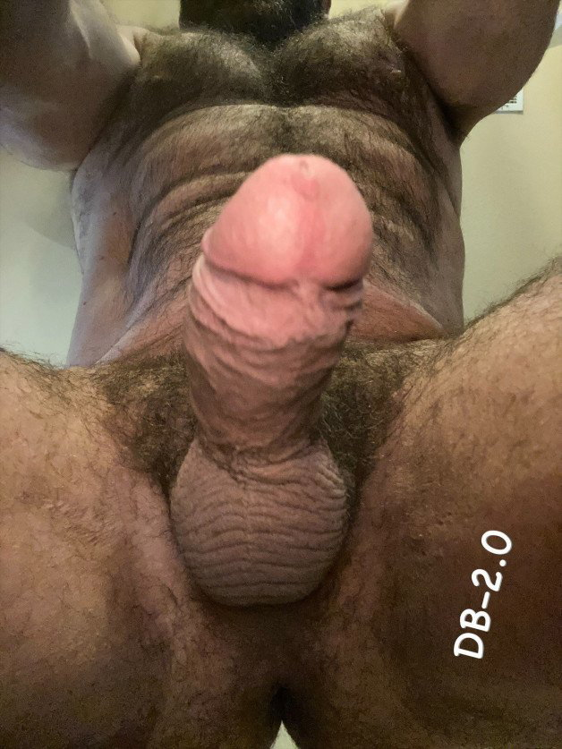Photo by DB-2.0 with the username @DB-2.0, who is a verified user, posted on October 20, 2023. The post is about the topic Beautiful Cock and the text says 'Husband is home and horny as you can tell. I can't get there to relieve his balls. Would anyone be willing to go do it for me?'