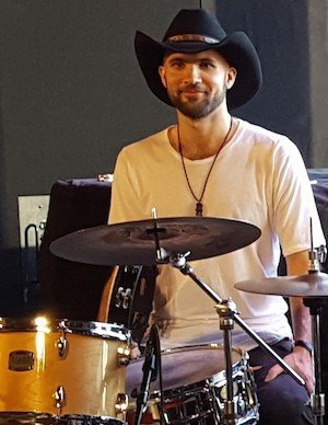 Album by DirtyDaddyFunStuff with the username @DirtyDaddyPorn, who is a verified user,  February 20, 2024 at 12:25 AM and the text says 'Jazz Cowboy Joe Saylor   #hairy #otter #bald #cowboy #beard #stubble #drummer #music #bigears #jazz'