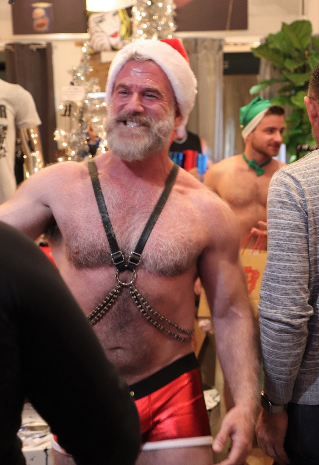 Album by DirtyDaddyFunStuff with the username @DirtyDaddyPorn, who is a verified user,  December 5, 2023 at 10:55 PM and the text says '#santa and his #elves.  #christmas'