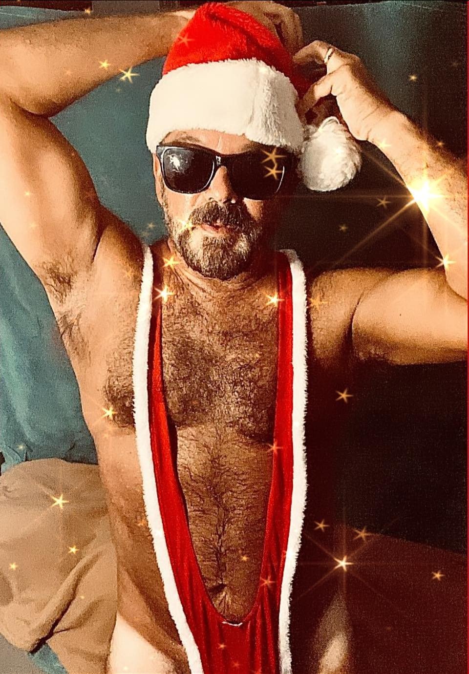 Photo by DirtyDaddyFunStuff with the username @DirtyDaddyPorn, who is a verified user,  January 8, 2024 at 10:54 PM and the text says '#christmas #hairy #santa #stubble #beards #bears #cowboys and more'
