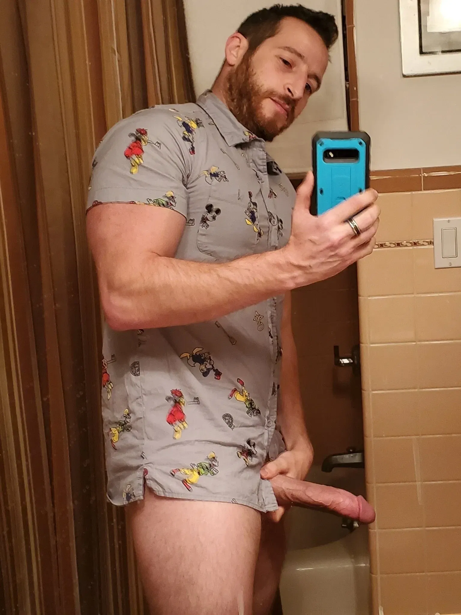 Album by DirtyDaddyFunStuff with the username @DirtyDaddyPorn, who is a verified user,  March 20, 2024 at 1:12 AM and the text says 'HUNG Ginger Muscle Stud.  #hung #cock #buff #muscles #bears #gingers #redheads #beards #hairy #cum #facials #daddy'