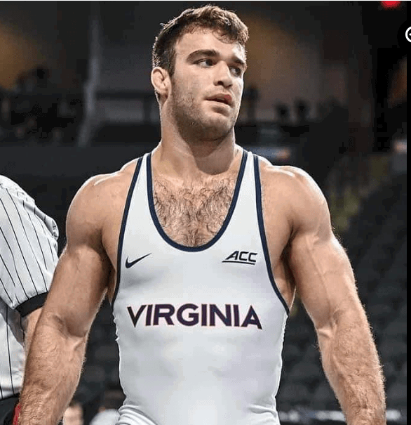 Album by DirtyDaddyFunStuff with the username @DirtyDaddyPorn, who is a verified user,  May 1, 2024 at 11:05 PM and the text says '#wrestling #muscles #hairy #otters #sweaty #buff #spandex #singlet'