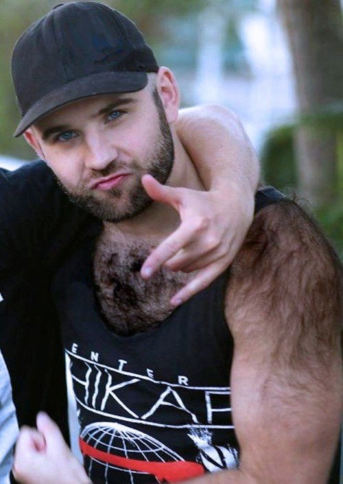 Album by DirtyDaddyFunStuff with the username @DirtyDaddyPorn, who is a verified user,  May 28, 2024 at 12:06 AM and the text says '#Hairy !!  #furry #werewolf #stubble #beards'