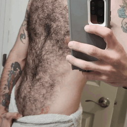 Photo by DirtyDaddyFunStuff with the username @DirtyDaddyPorn, who is a verified user,  May 6, 2024 at 6:26 PM and the text says '#otters #wolves #hairy #tats #ink'