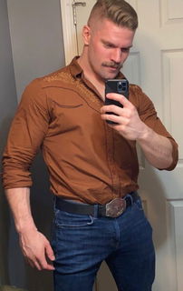 Album by DirtyDaddyFunStuff with the username @DirtyDaddyPorn, who is a verified user,  July 9, 2024 at 11:29 PM and the text says 'Hot 2 #cowboys'