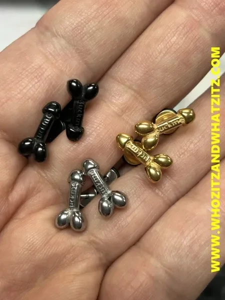 Photo by DirtyDaddyFunStuff with the username @DirtyDaddyPorn, who is a verified user,  April 5, 2024 at 8:10 PM and the text says 'Penis Suck Me Stud Earrings.  Gold, Black or Silver.
https://whozitzandwhatzitz.com/products/suck-me-penis-earrings'